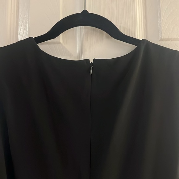 Peplum flair with cutout waist. - Picture 5 of 5